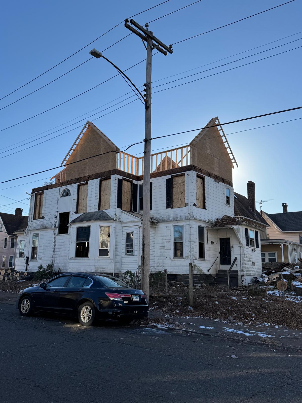 Colonial home exterior before full renovation project by Riverstone Development general contractor in Bridgeport CT