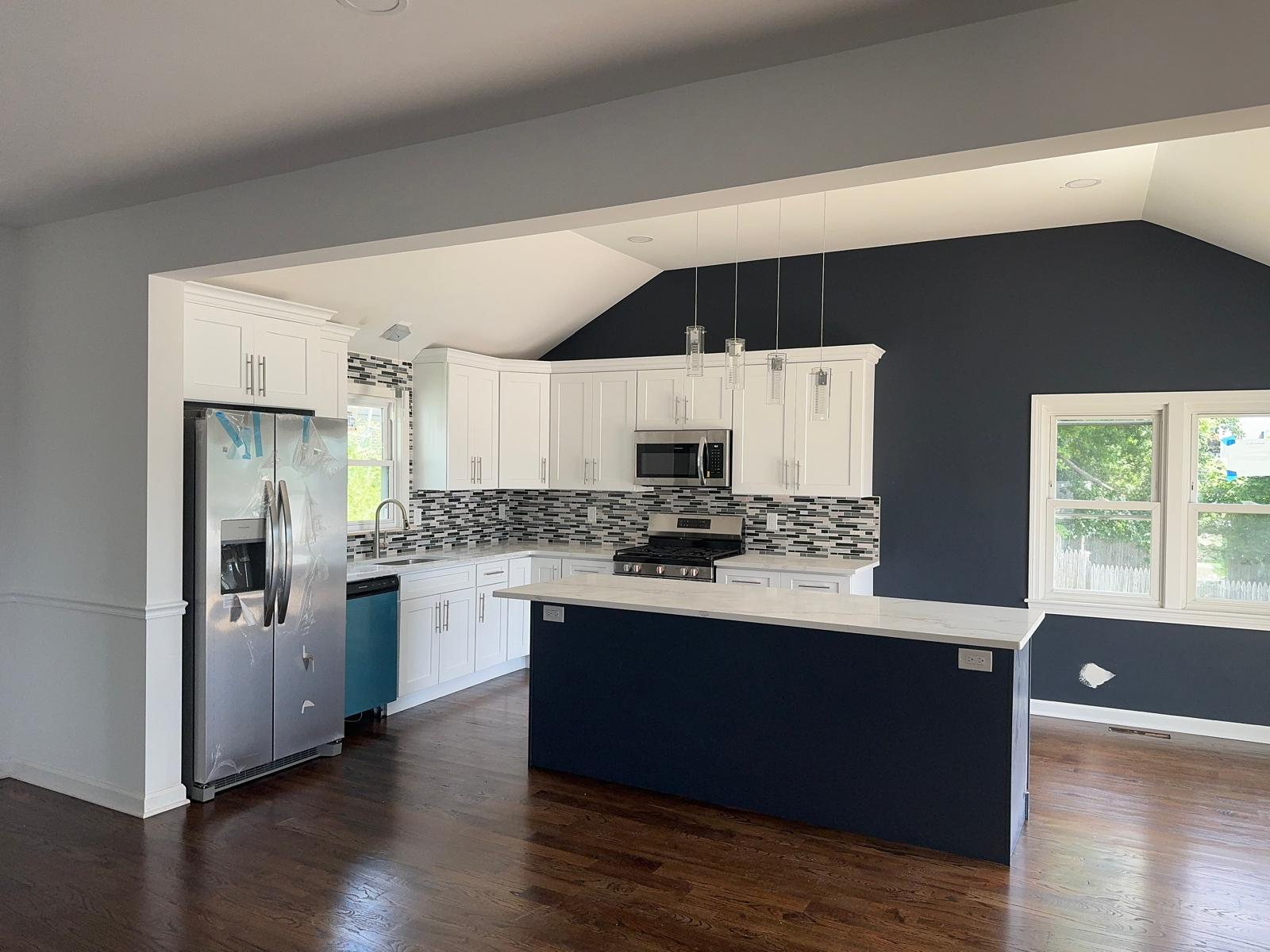 Modern kitchen renovation with new cabinets and countertops by Riverstone Development general contractor in Bridgeport CT